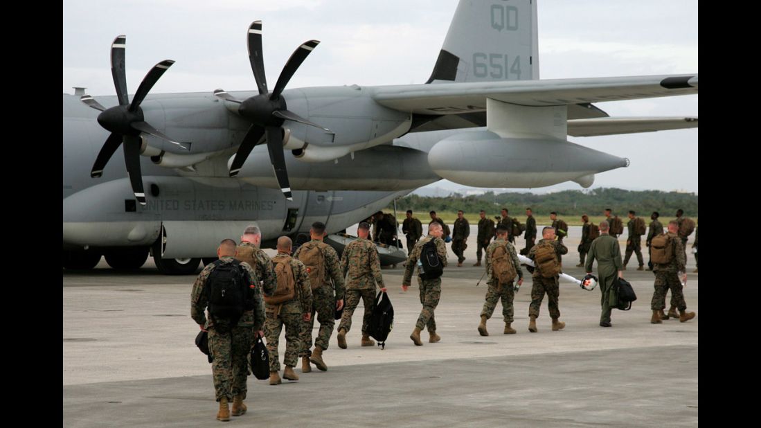Japan-based Marines board an aircraft for areas hit by Typhoon Haiyan hit in the Philippines at Marine Corps Air Station Futenma on November 10. 