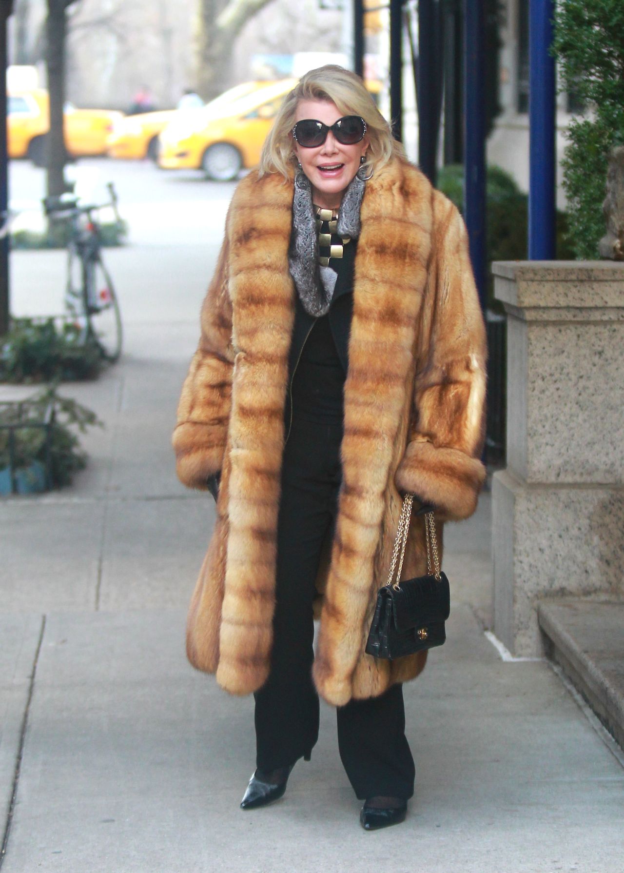 Joan Rivers keeps warm in New York City on December 26.
