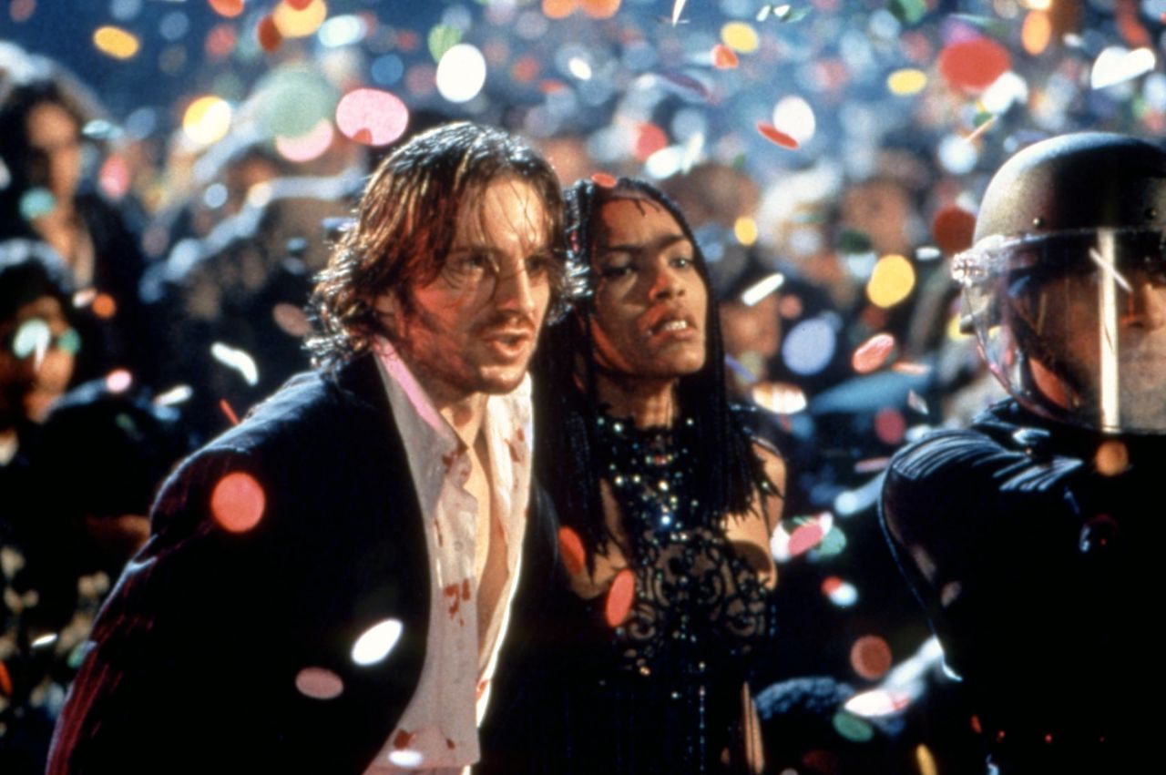 <strong>"Strange Days" </strong>--<strong>  </strong>"Cheer up, world's going to end in 10 minutes anyway," Tom Sizemore tells his friends during Kathryn Bigelow's sci-fi thriller, which takes place in the last day or so of the 20th century, when everyone was partying like it was 1999 (well, because it was). Black-market dealer Lenny (Ralph Fiennes) and his bodyguard Mace (Angela Bassett) try to solve a rape and murder caught on a tape that was recorded directly from the victim's cerebral cortex. Talk about a new way of experiencing other people's memories. Maybe some other New Year's Eve, this will be how we watch movies -- jacking in.