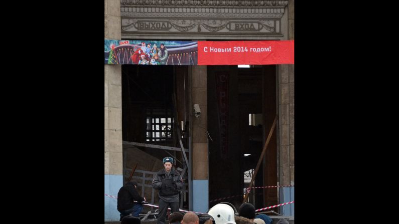 An officer stands guard outside the station.