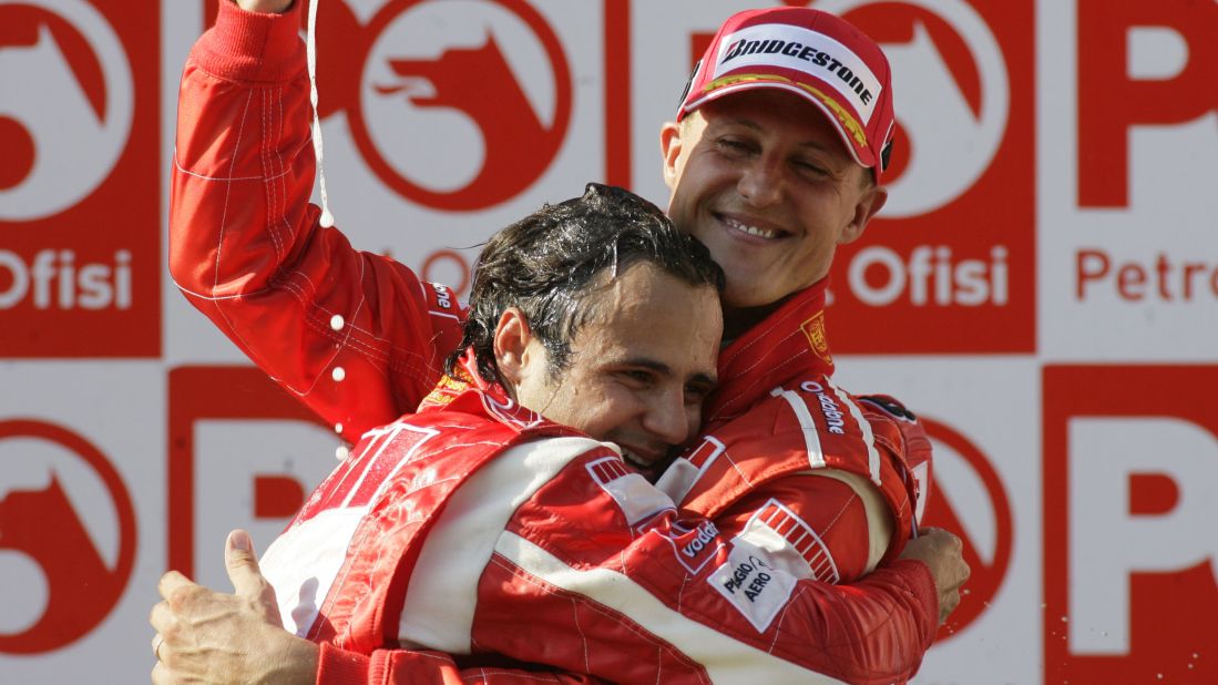 Felipe Massa hugs Schumacher after Massa won first place in the Formula 1 Grand Prix of Turkey in Istanbul in 2006.