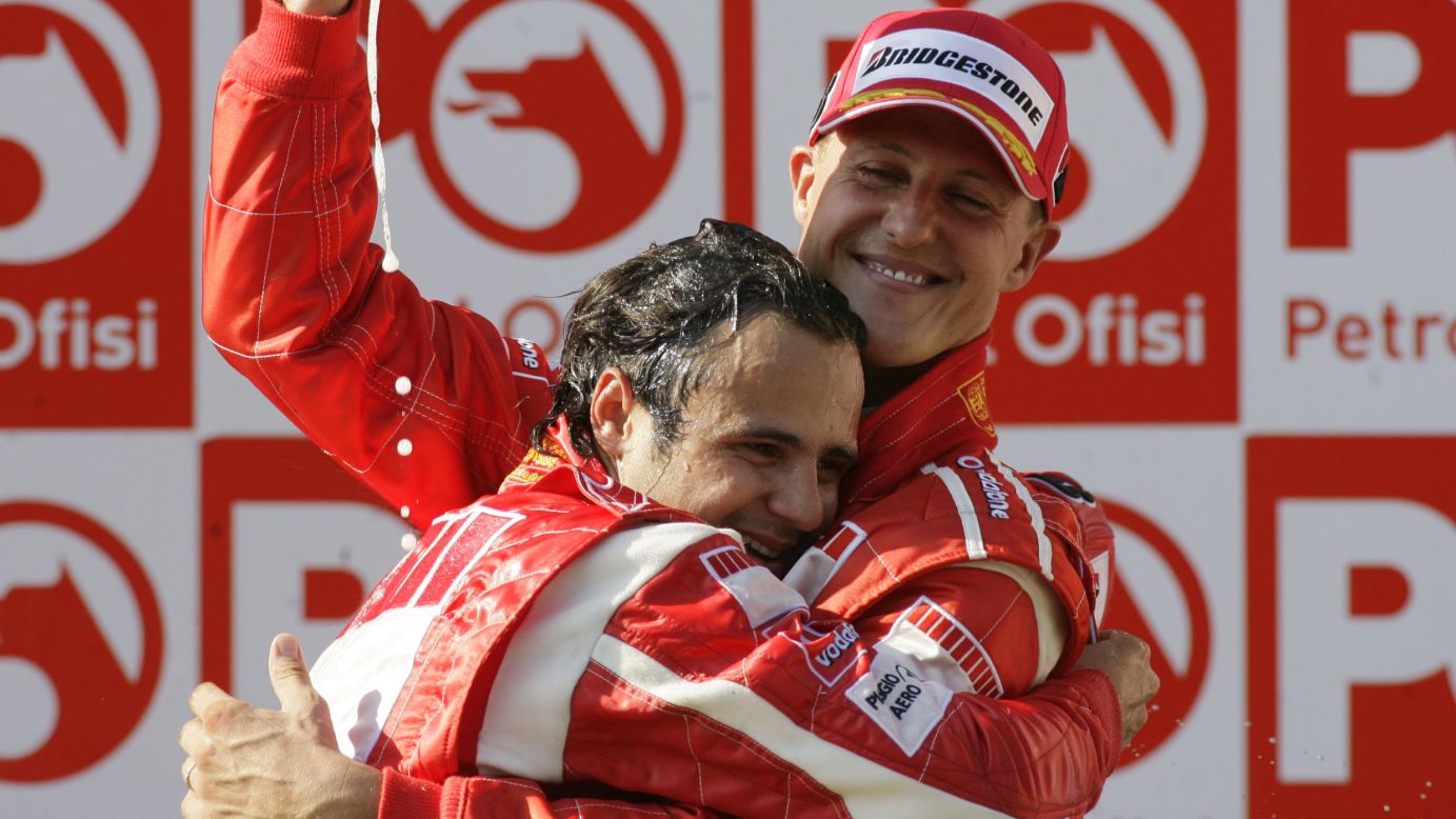 Felipe Massa hugs Schumacher after Massa won first place in the Formula 1 Grand Prix of Turkey in Istanbul in 2006.