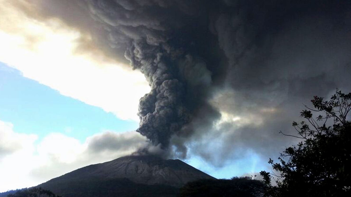 View of the Chaparrastique volcano spewing ashes and smoke in southern El Salvador on December 29.