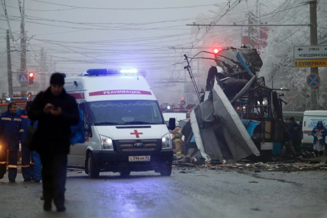 An ambulance leaves the site of a trolleybus explosion.