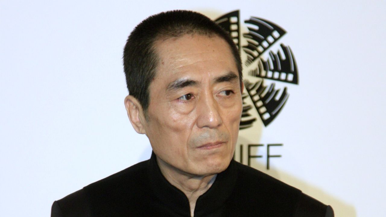 This file photo shows Chinese filmmaker Zhang Yimou attending a commercial event in Beijing in April.