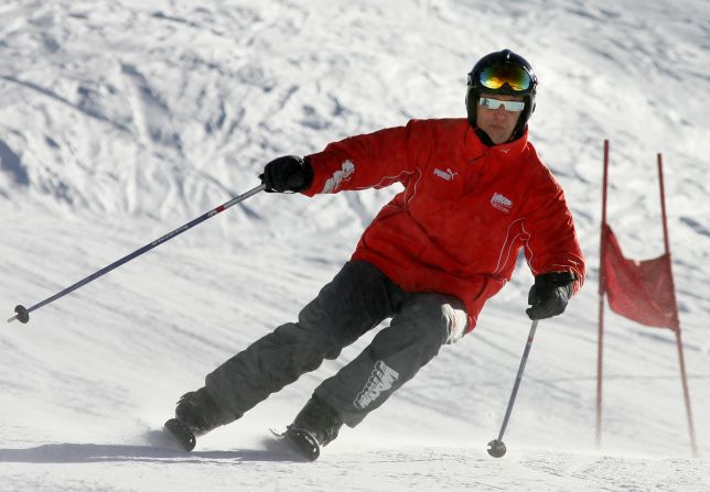 Schumacher suffered severe head injuries when he hit a rock during a skiing trip to the French Alps. He was a strong skier and is seen here navigating a slalom course at the Italian ski resort of Madonna di Campiglio in 2005. 