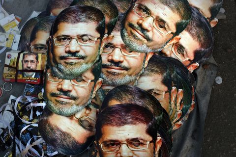 Mohamed Morsy masks are displayed for sale at the base for supporters of the ousted president on July 12, 2013 in Cairo, Egypt. The country has been in a state of political paralysis following the ousting of former president and Muslim Brotherhood leader Morsy by the military.
