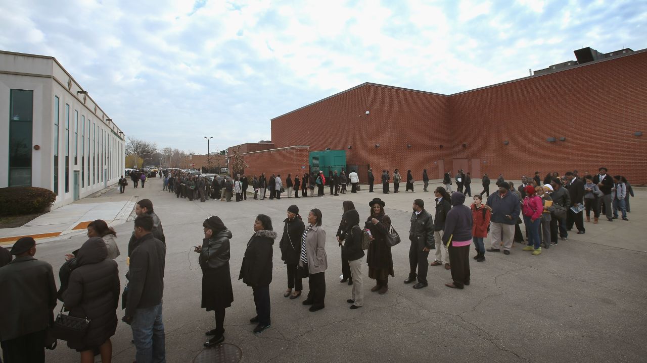 Job seekers attend a job fair in Chicago in 2012. When the doors opened at 9 a.m., the line was half a mile long.