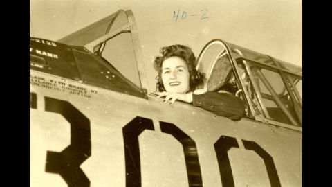 Alma Jacomini in the cockpit of her airplane at Garden City Army Air Base in Kansas. 