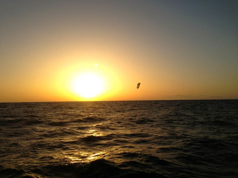 Blom is silhouetted against a glorious Atlantic sunset while using a jump technique. 