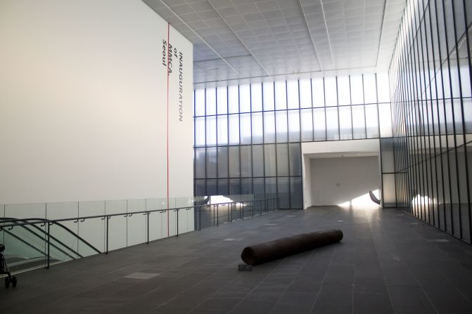 A wall of windows keeps the first floor of Seoul's MMCA brightly lit. This section of the museum currently features Choi In Su's "At the Edge of Sound," made in 1992 from cast iron.