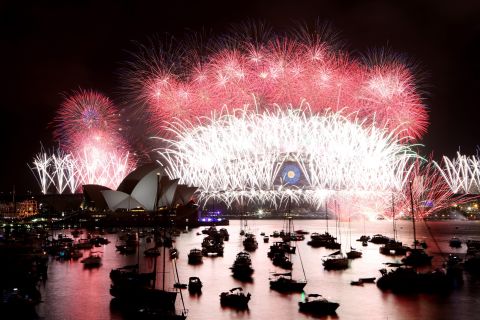 Fireworks explode near the Harbor Bridge during New Year's celebrations in Sydney. As the city's spectacular celebration got under way, six people were rescued from a sinking boat on Sydney Harbor, The Sydney Morning Herald reported.