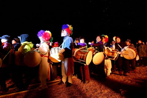 South Koreans celebrate with drums during a New Year's festival in Jeju, South Korea.