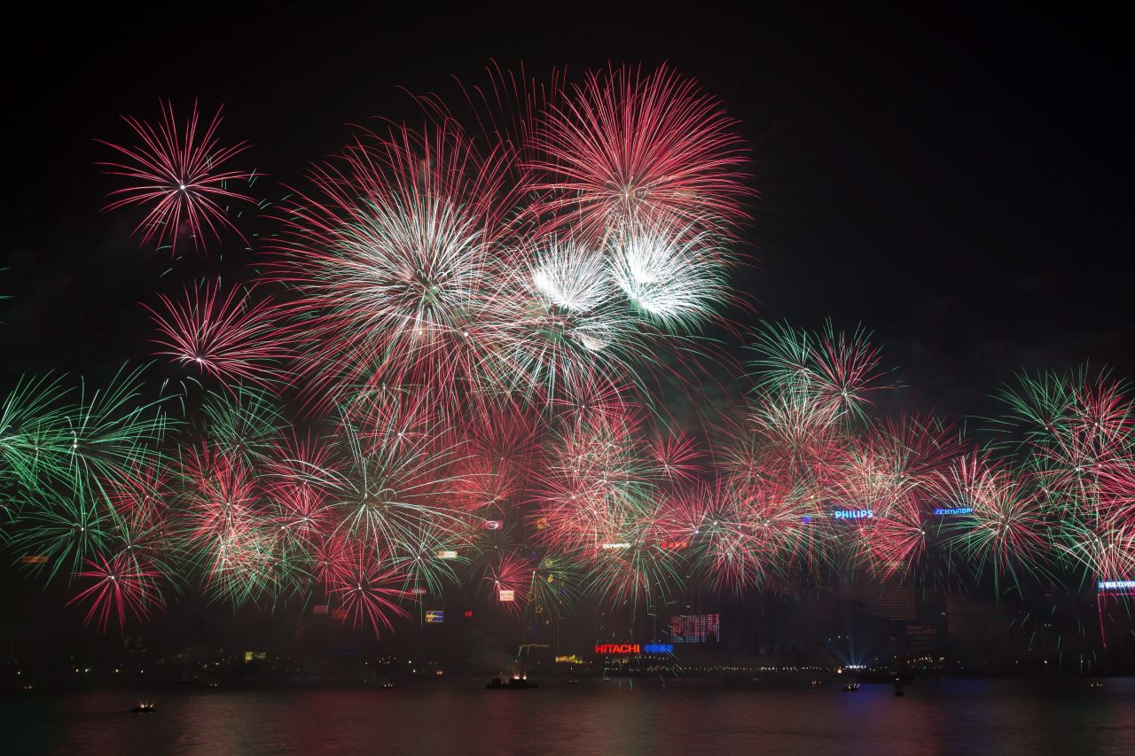 Fireworks are seen over Victoria Harbor in Hong Kong.