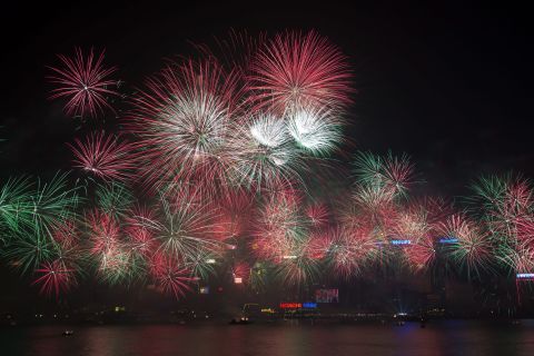 Fireworks are seen over Victoria Harbor in Hong Kong.