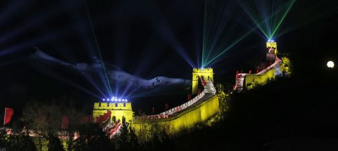 Laser lights shoot from towers at the Great Wall of China in Beijing.