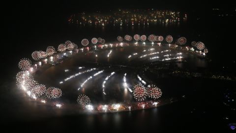 New Year's fireworks explode over Palm Jumeirah in Dubai, United Arab Emirates. Dubai set a new world record for largest fireworks display, according to Guinness World Records. The show featured 400,000 pyrotechnics and spanned more than 100 kilometres (62 miles).
