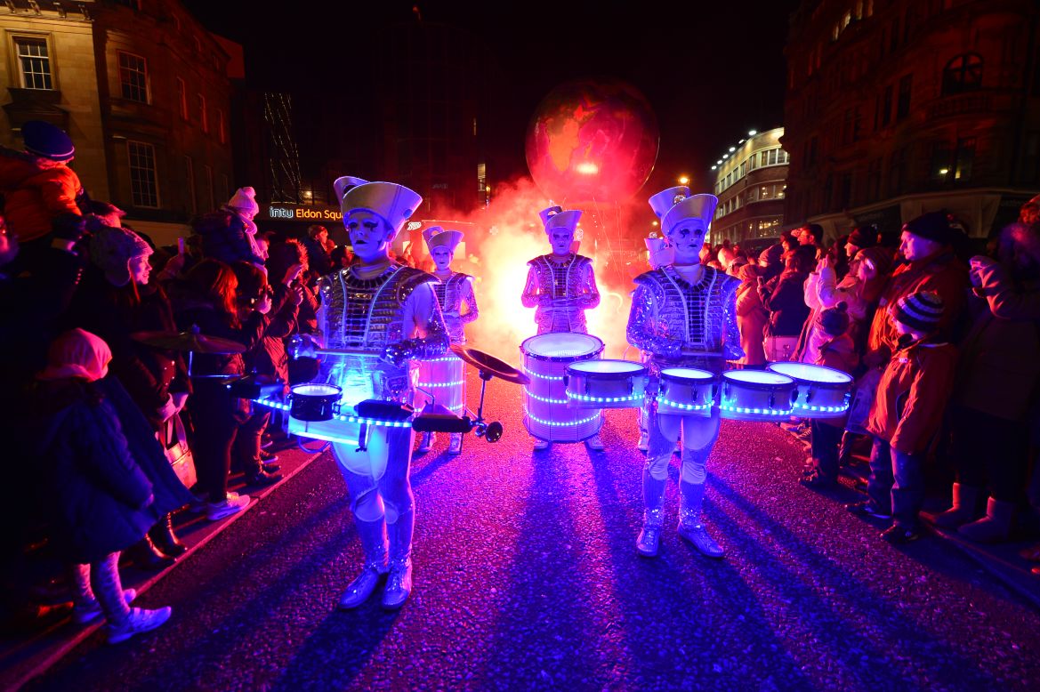 Drummers perform at the New Year's Winter Carnival in Newcastle, England.