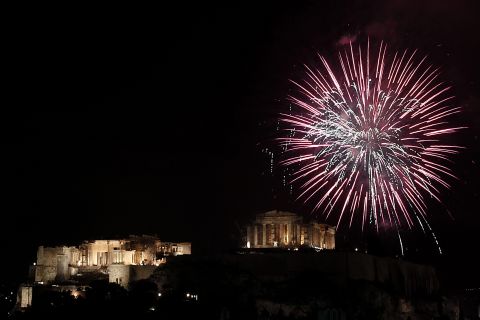 Fireworks burst over the ancient Parthenon temple on the Acropolis hill in Athens, Greece.