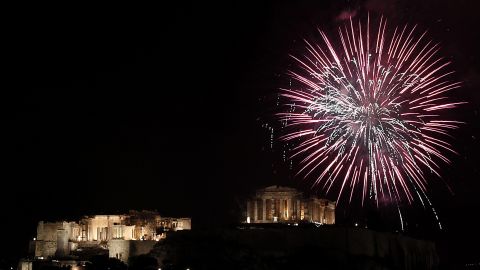 Fireworks burst over the ancient Parthenon temple on the Acropolis hill in Athens, Greece.