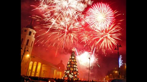 People ring in the new year at Cathedral Square in Vilnius, Lithuania.