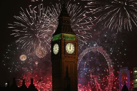 Fireworks light up Big Ben and the London skyline during New Year's celebrations.