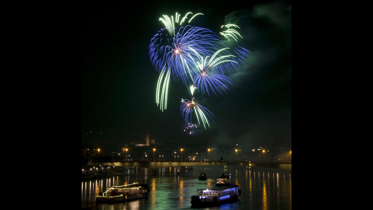 New Year's fireworks illuminate the Rhine River in Basel, Switzerland.