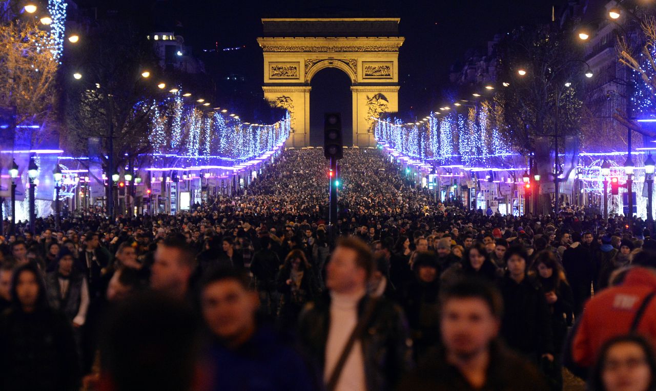 People celebrate the new year on the Champs-Elysees in Paris.
