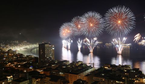 Fireworks light the sky over Copacabana Beach in Rio de Janeiro just after midnight on Wednesday, January 1.