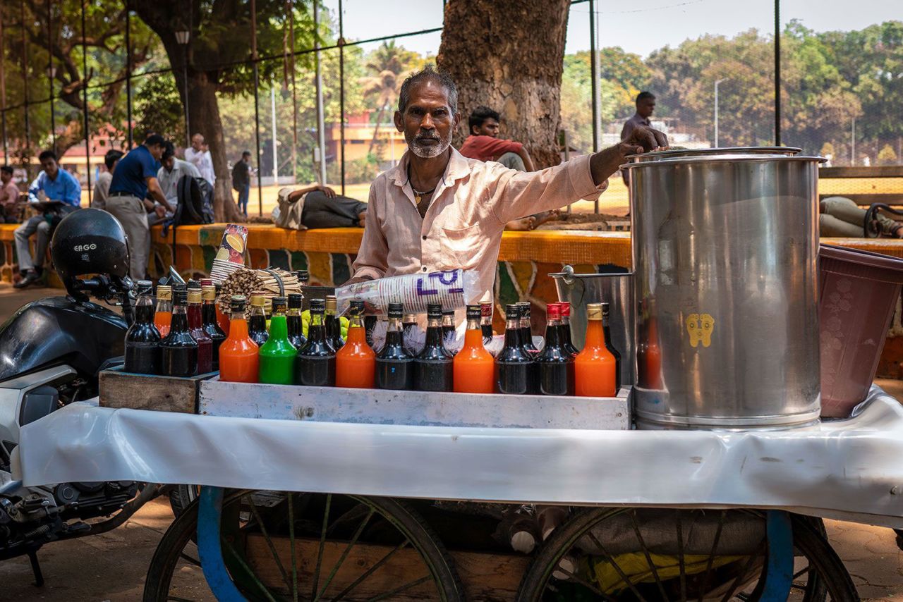 Chanu Gupta, a shaved ice vendor in Mumbai, poses for a picture during an interview with CNN on April 16. 