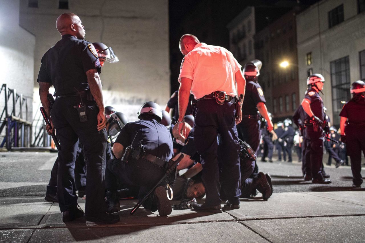 Police arrest a man during protests in New York early on Monday, June 1.