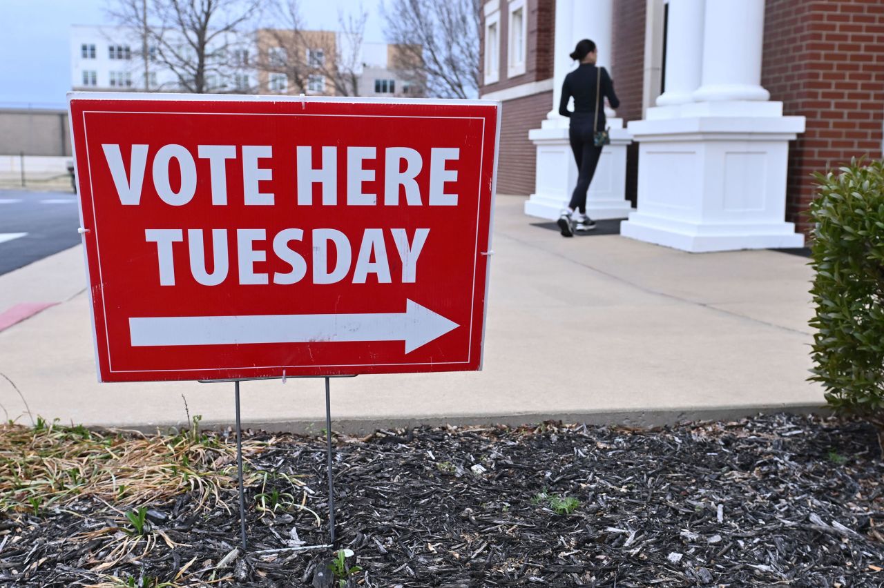 A voter heads into the Central Methodist Church to cast their ballot on Tuesday in Fayetteville, Arkansas.