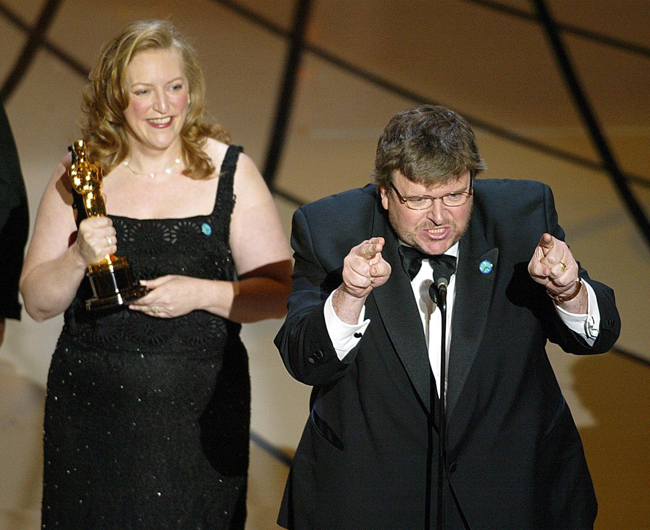Michael Moore denounced the US invasion of Iraq while accepting the Oscar for best documentary at the 2003 Academy Awards.