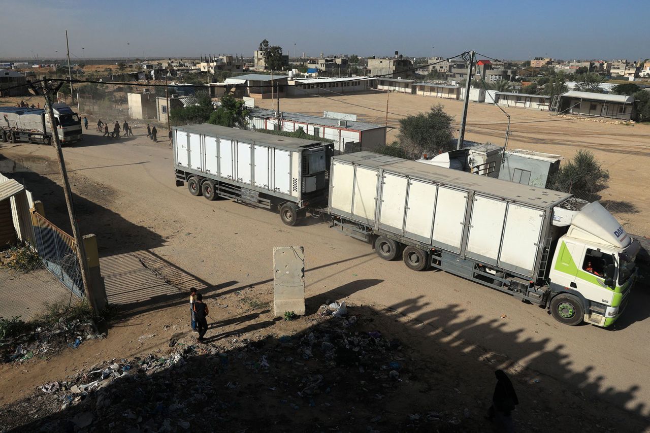 Trucks carrying humanitarian aid enter Gaza via the Rafah crossing with Egyp on Friday, November 24.