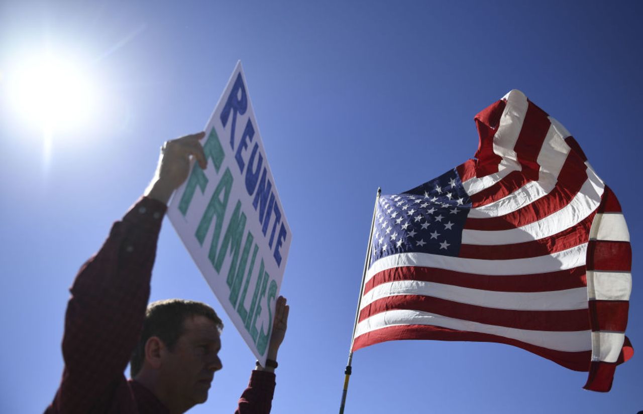 Demonstrators display signs at the Tornillo Port of Entry near El Paso, Texas, June 21, 2018 during a rally against the US administration's family separation policy.