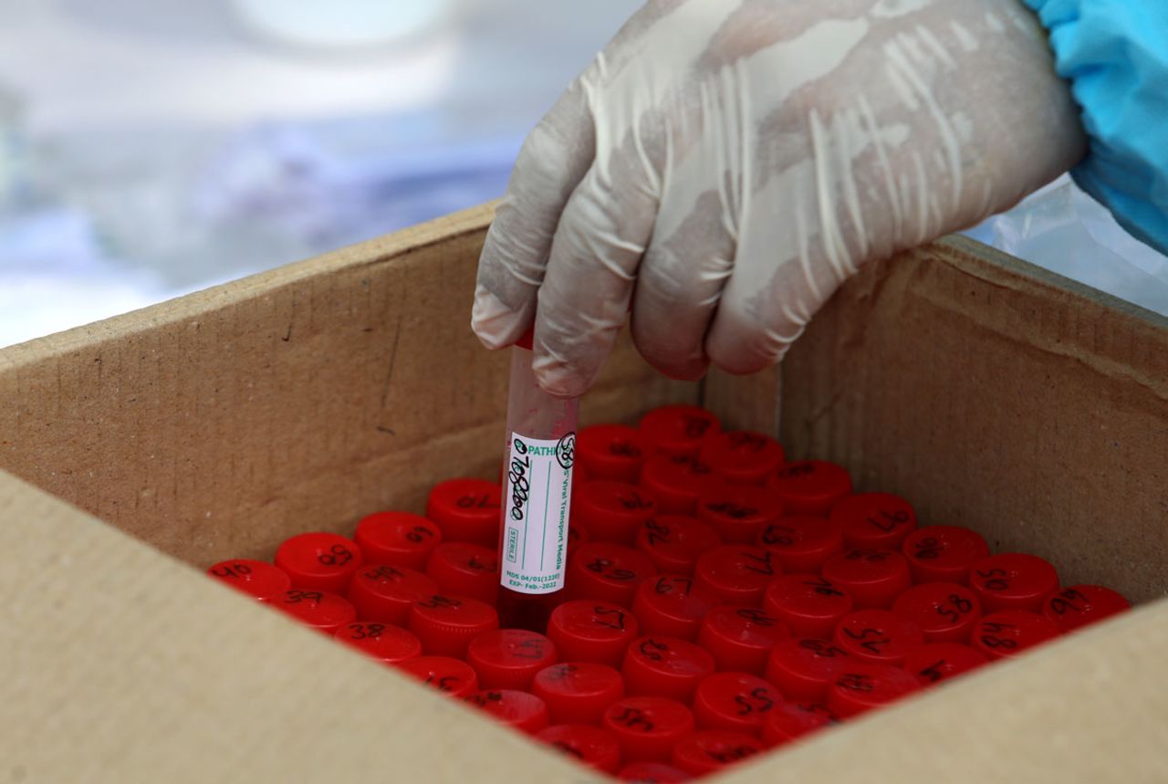 A health worker places a swab sample vial into a box after a roadside Covid-19 RT-PCR test in New Delhi, India on April 5.