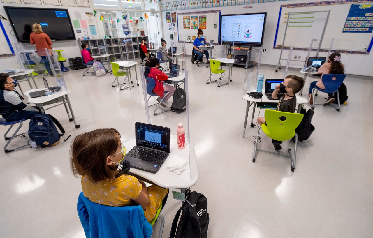 Elementary school students sit distanced from each other in Anaheim, California, on April 12.