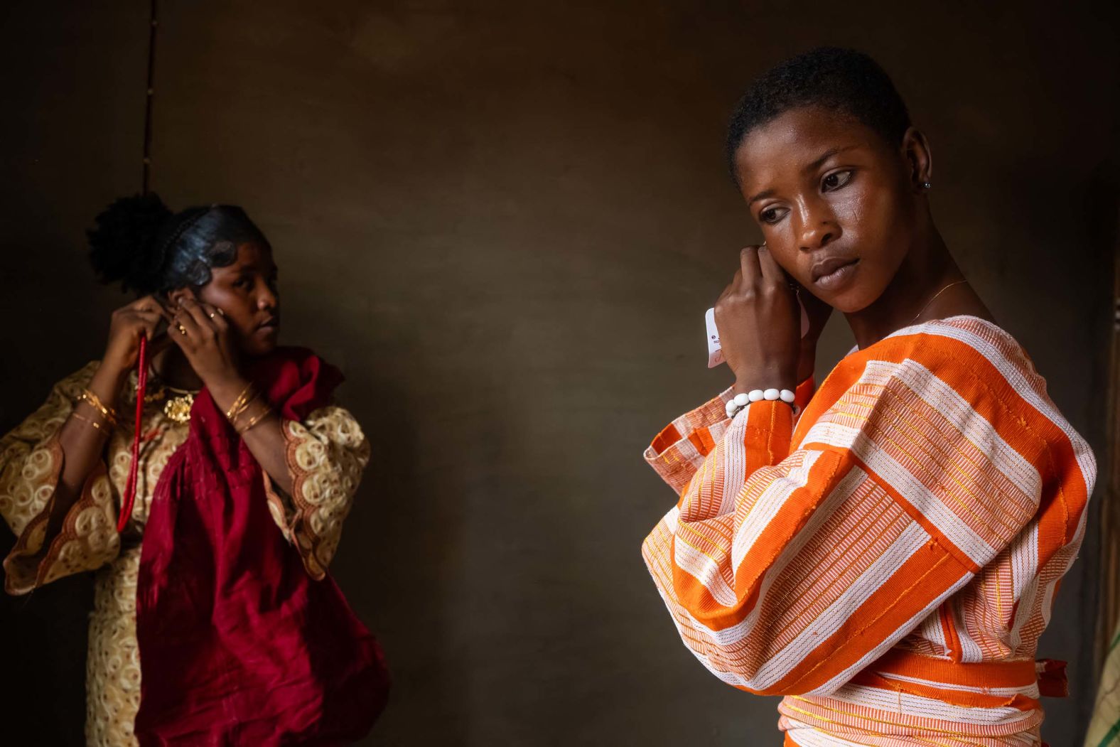 Brides dress up for a mass wedding event in Shao, Nigeria, on Friday, October 31.