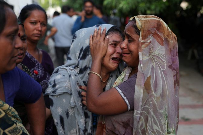 Dabu Patni cries upon learning that her brother Akash was aboard <a  target="_top" href="/newspapers?url=https://www.cnn.com/world/gallery/air-india-plane-crash-ahmedabad/index.html">the plane that crashed</a> in Ahmedabad, India, on Thursday, June 12.