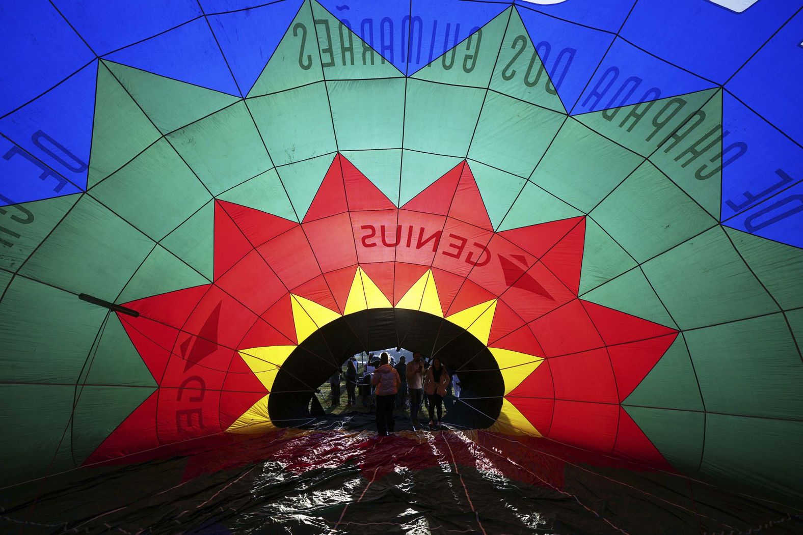 A hot-air balloon is partially inflated as it is prepared for a World Ballooning Championships race in Colonia Yguazú, Paraguay, on Friday, August 29.