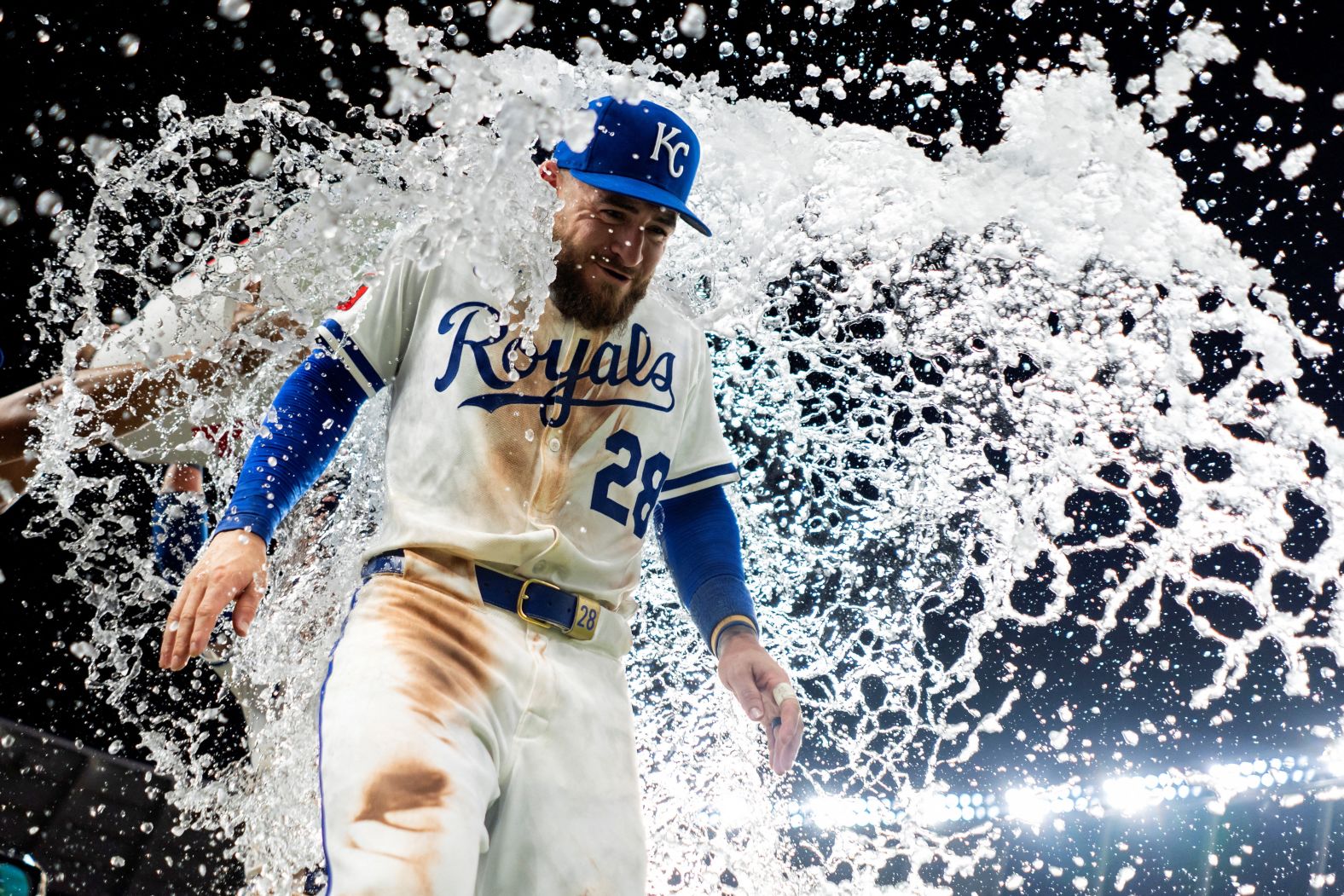 Kansas City Royals center fielder Kyle Isbel is doused by teammates after helping his team defeat the Atlanta Braves in a Major League Baseball game on Tuesday, July 29.