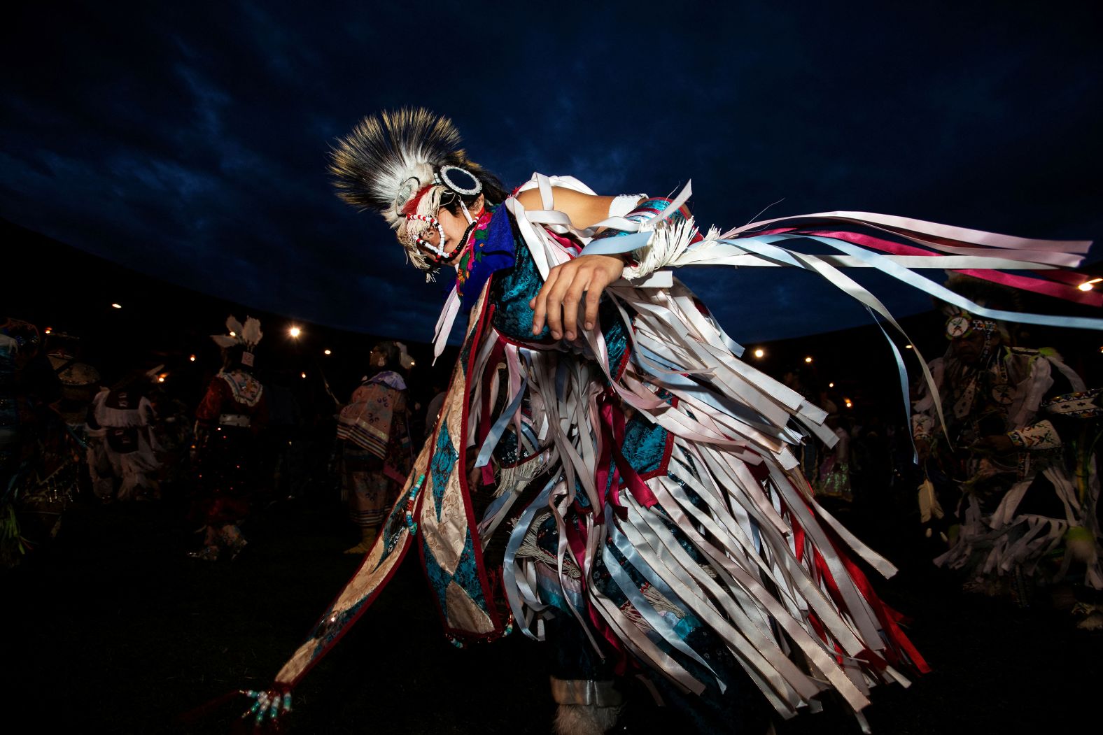 Dancers take part in the first night of the 44th annual Kamloopa Powwow in Kamloops, British Columbia, on Friday, June 27.