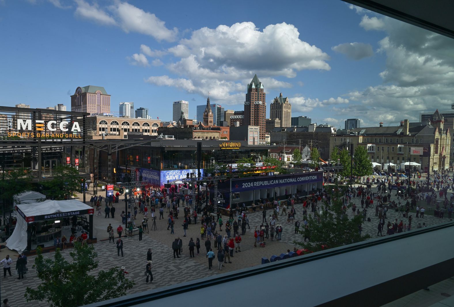 Delegates walk outside the Fiserv Forum on Wednesday.