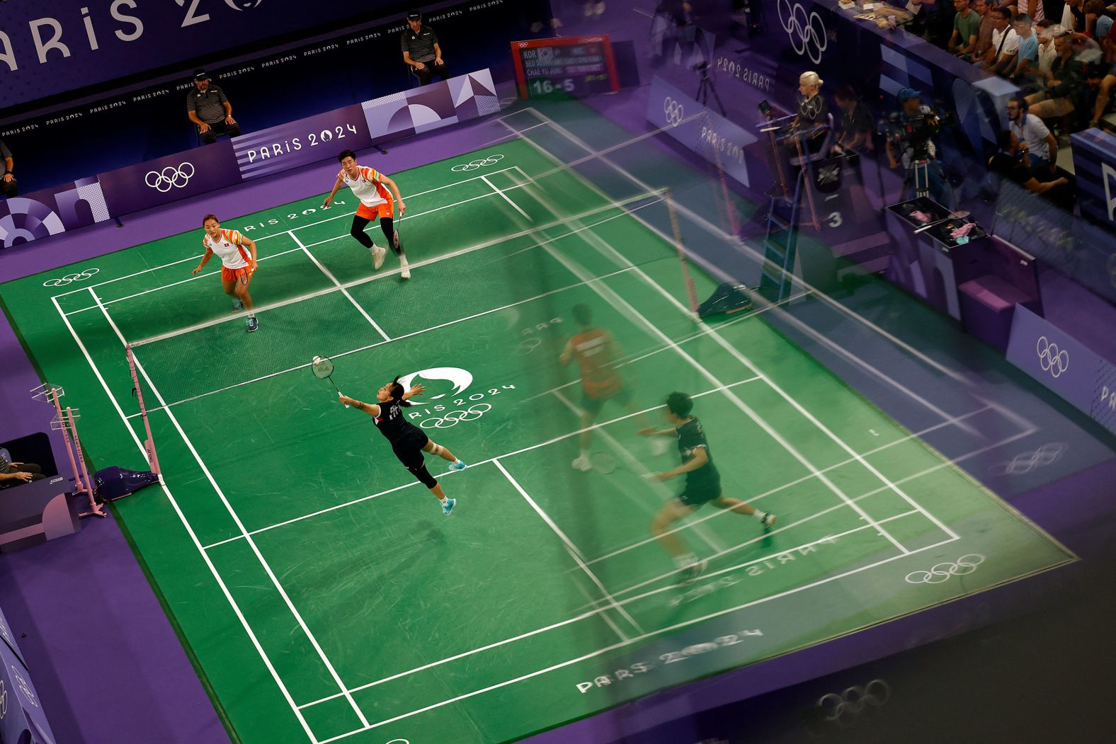 South Korean badminton player Chae Yoo-jung plays a shot during a mixed doubles match at the <a href="index.php?page=&url=https%3A%2F%2Fwww.cnn.com%2F2024%2F07%2F26%2Fsport%2Fgallery%2Fparis-olympics-2024%2Findex.html">Paris Olympics</a> on Wednesday, July 31.