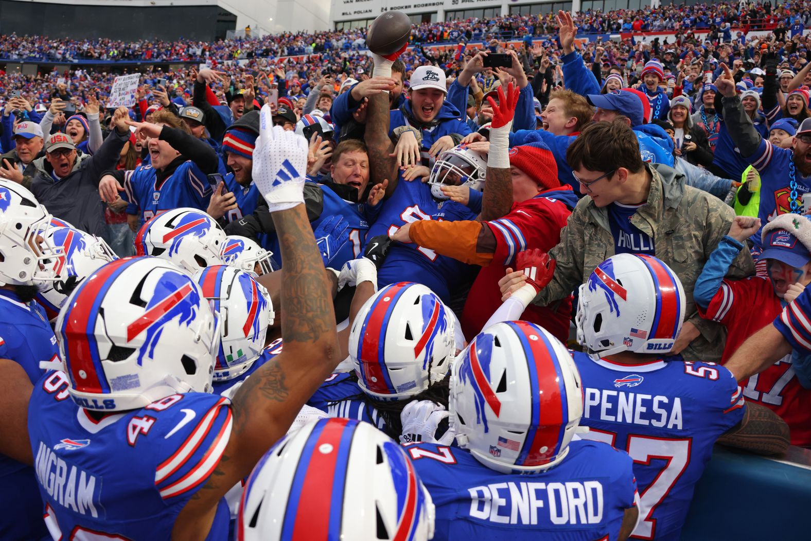 Buffalo Bills defensive tackle Jordan Phillips celebrates with fans after an interception against the New York Jets on Sunday, December 29. The Bills won 40-14.