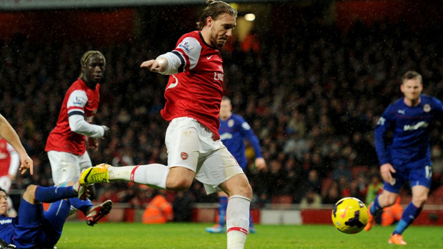 Niklas Bendtner powers Arsenal ahead in the 88th minute of their home EPL match against Cardiff City.