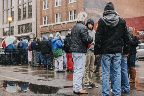 Customers wait in a long line for their turn to buy recreational marijuana outside the LoDo Wellness Center on Wednesday, January 1, in Denver. Colorado is the first state in the nation to allow retail pot shops.