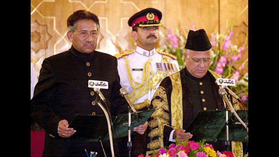 Musharraf, left, takes the presidential oath of office in Islamabad, Pakistan, on June 20, 2001. Musharraf appointed himself president after leading a successful coup against Prime Minister Nawaz Sharif in 1999. He would also remain head of the army.
