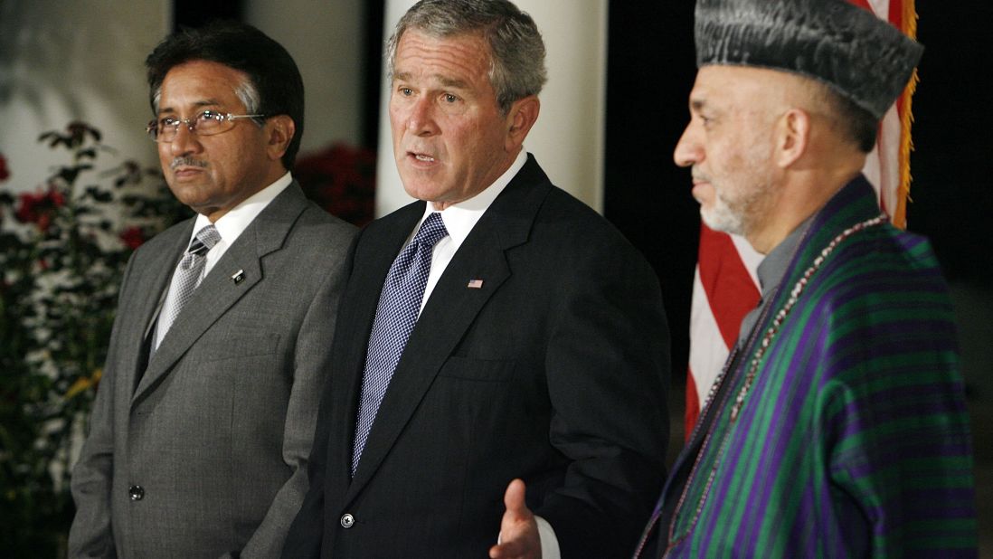 Musharraf, then-U.S. President George W. Bush and Afghanistan President Hamid Karzai stand in the Rose Garden of the White House as Bush delivers remarks in 2006.