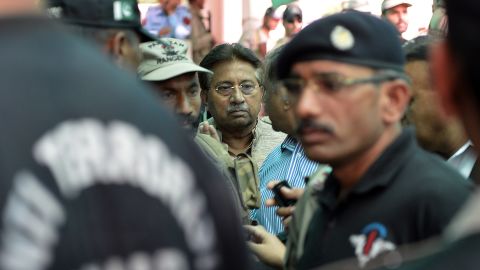 Musharraf is escorted by soldiers as he arrives at an anti-terrorism court in Islamabad on April 20, 2013. A Pakistani court rejected Musharraf's request for a bail extension, and Musharraf was put under house arrest.